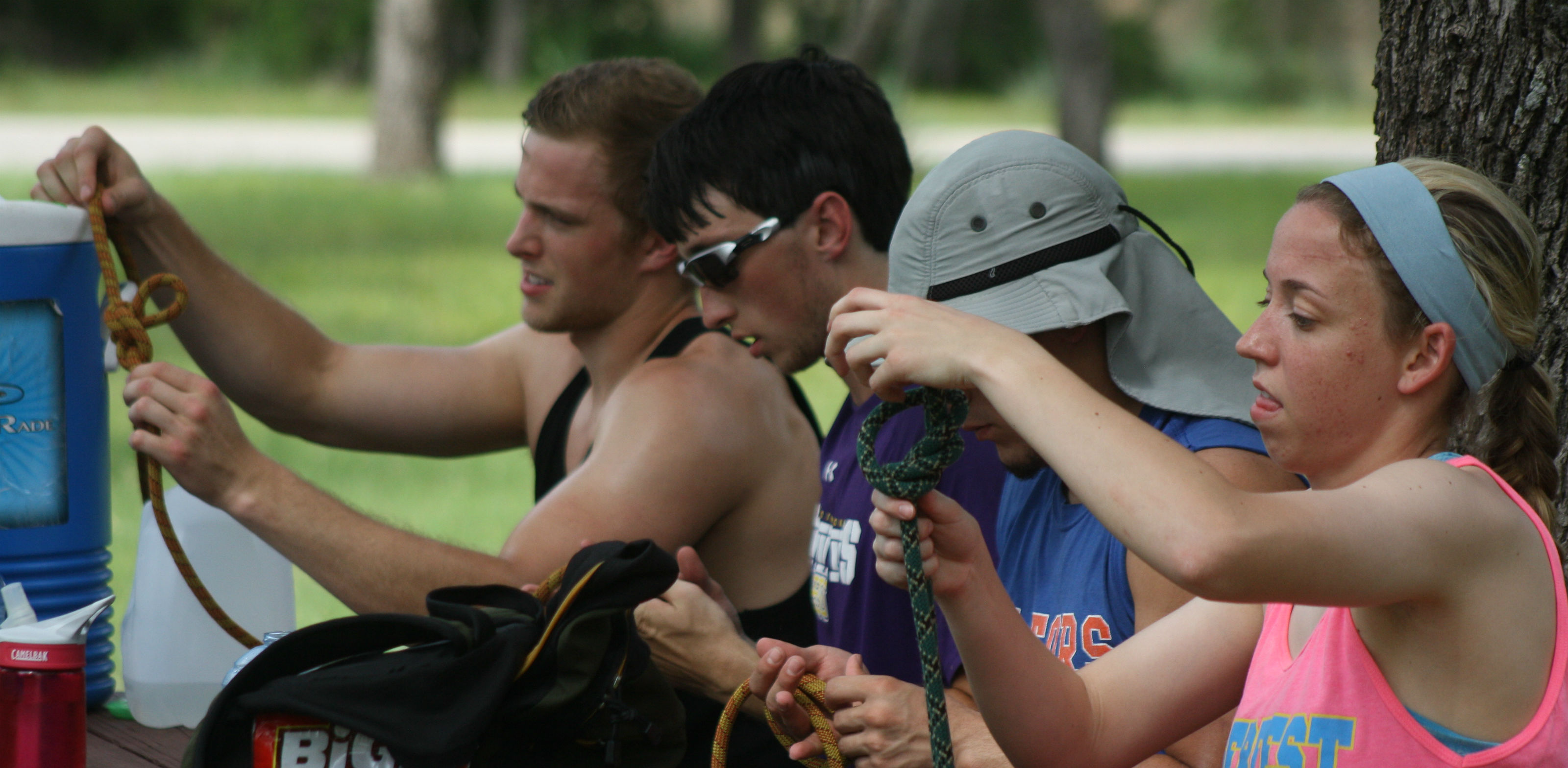 fitness, recreation, and sports management students tying knots into ropes