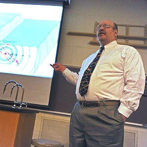 Photo of Geology professor lecturing in class.