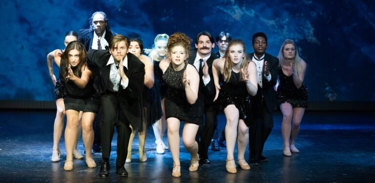 HSU Theatre students dancing on stage.