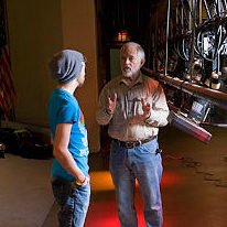 Theater professor giving one-on-one instruction to student