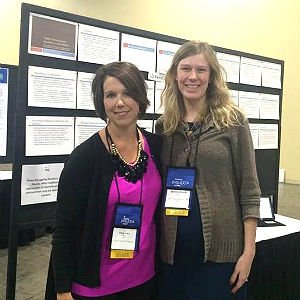 Reading Specialist certified student standing with her professor