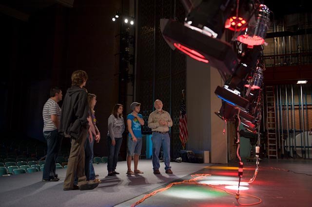HSU professors showing Theater Program students the stage lights