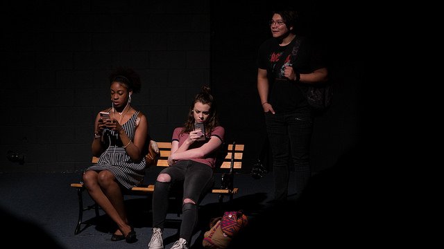 HSU theater students acting like they are on their phones on stage
