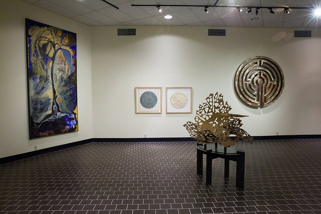 art exhibition with paintings on the walls at Ira M. Taylor Memorial gallery at HSU