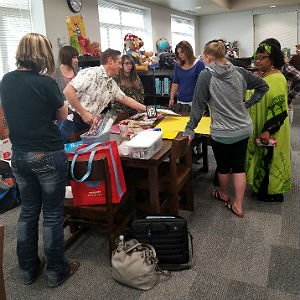 Master of Education in Gifted Education professor instructs his students in classrom