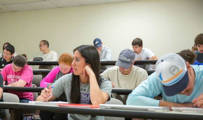 HSU students in lecture hall taking notes