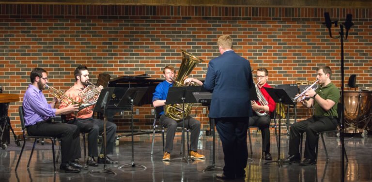 A group of music students perform a senior recital.