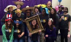 HSU student group photo posed with various costume accessories