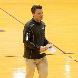 MBA Sport Business program professor speaking to students in a gym