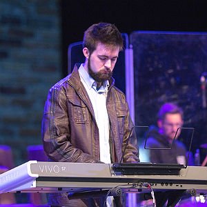 HSU Music Major playing the piano during worship