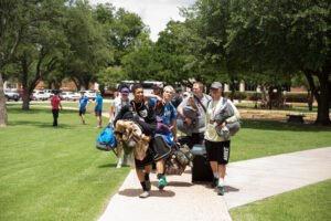 Students arrive at HSU for Fellowship of Christian Athletes camp.