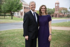 HSU President Eric Bruntmyer pictured with wife on campus