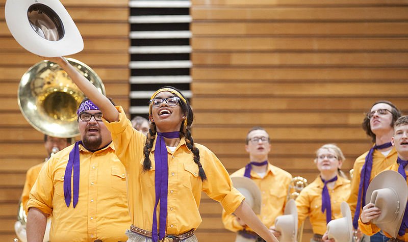 HSU band and dancers practicing halftime show in gym