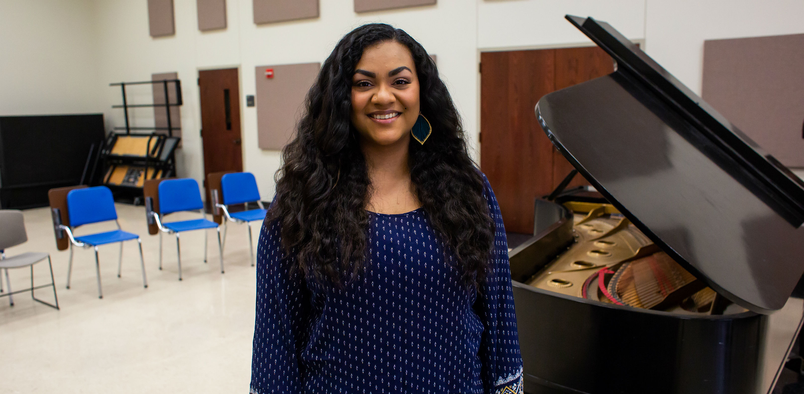 Photo of student inside the choir room.