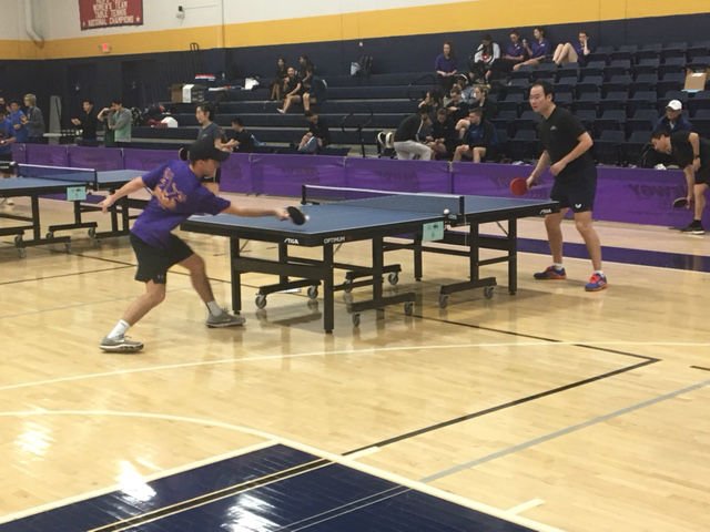 An HSU club table tennis member plays a match.