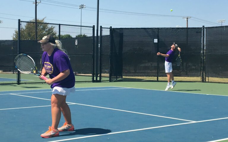 HSU students playing tennis at the courts