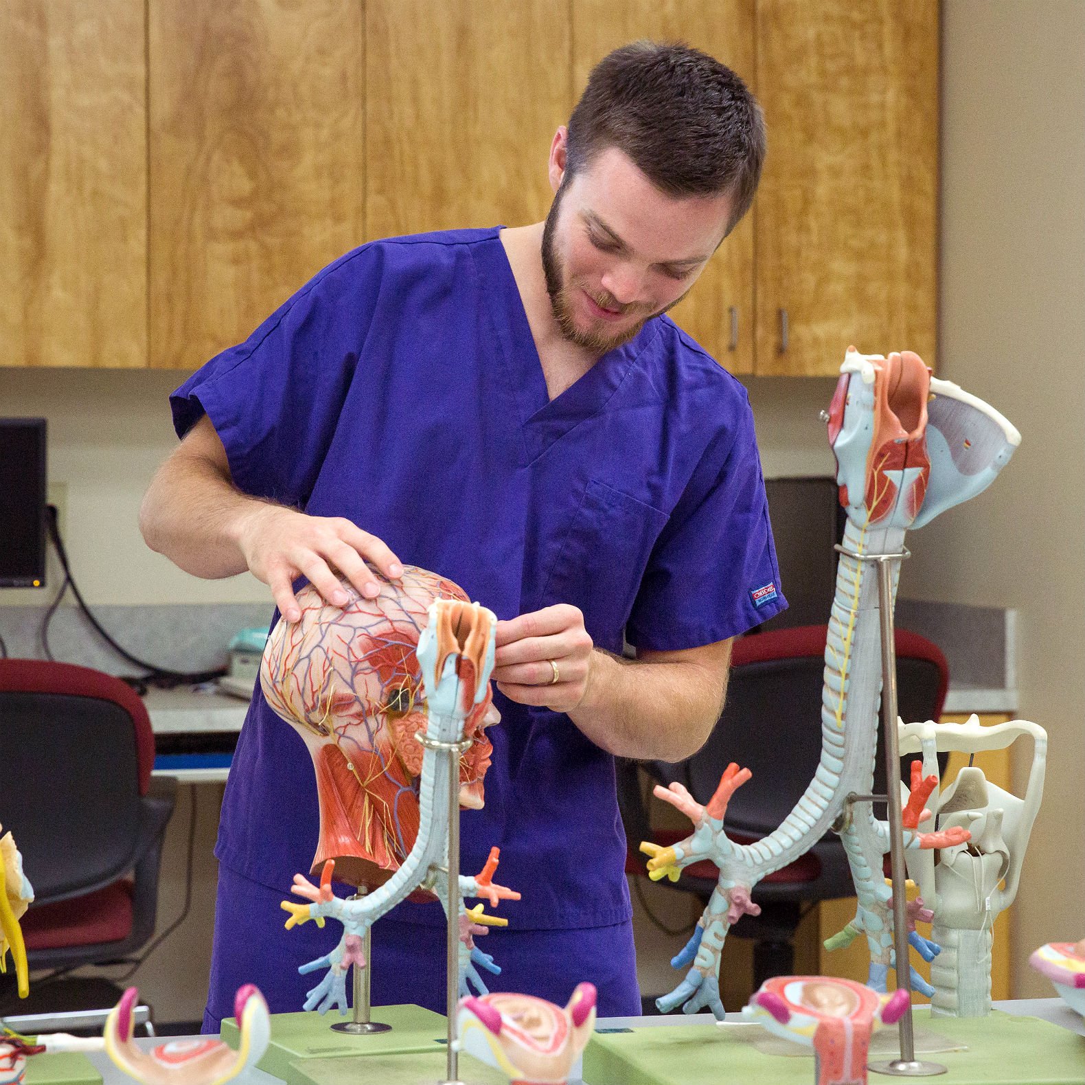 Photo of a student practicing nursing.