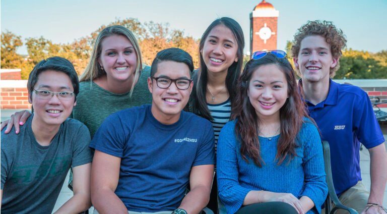 A group of international HSU students pose for the camera.