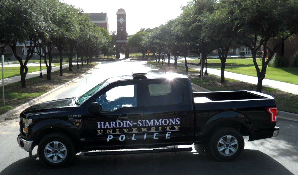 Photo of police's car parking in front of HSU clock tower.