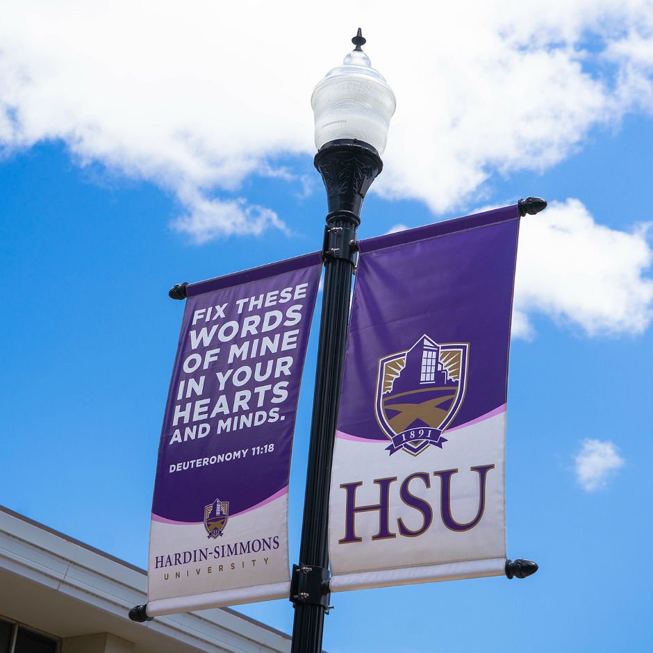 Photo of HSU flyer on a Street Light.