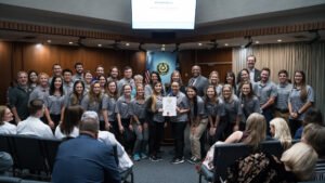 PT students accepting proclamation from Mayor Anthony Williams