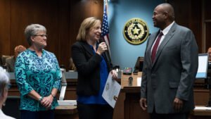 Dr. Jill Jumper accepts the proclamation from Mayor Anthony Williams