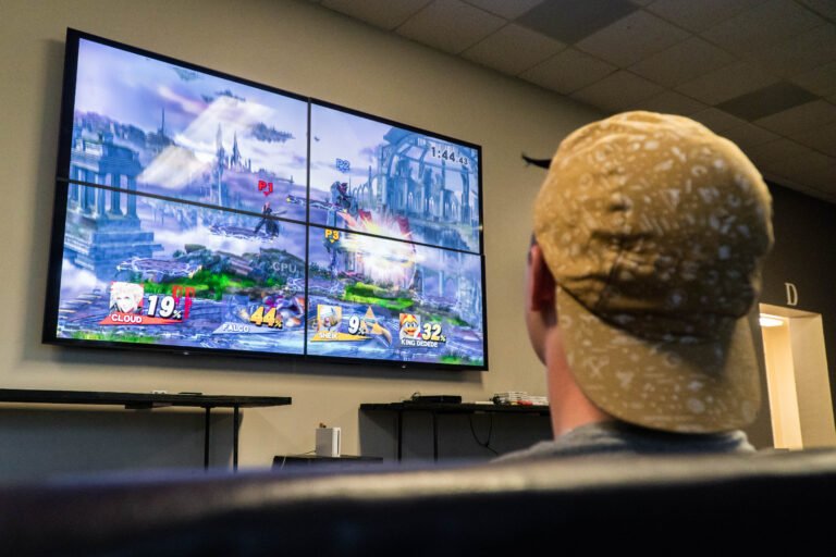 HSU watching large television in HSU Ferguson Hall