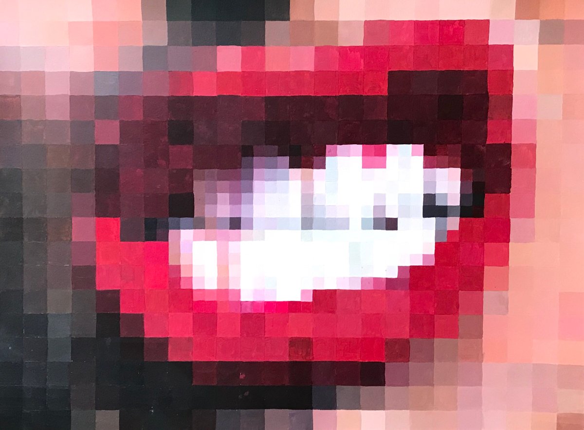 Student painting of lips for art show.