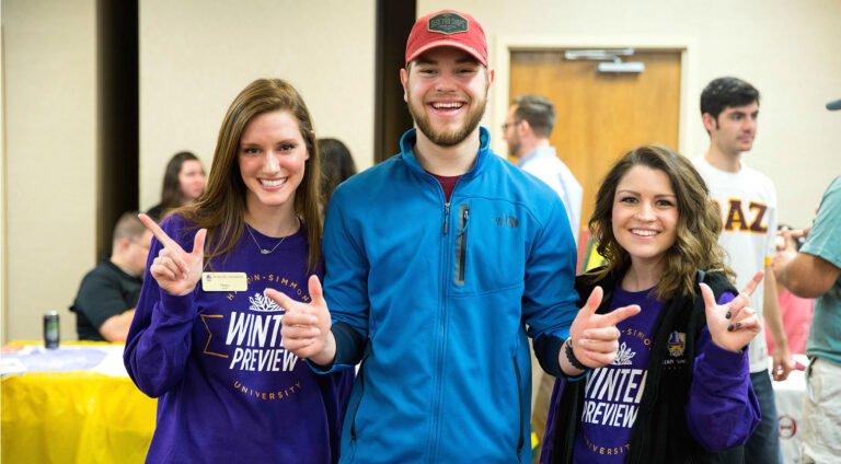Photo of admissions ambassadors at a preview event.