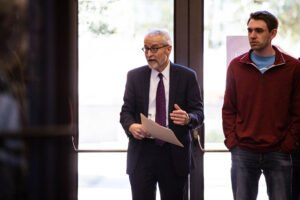 Dr. Bob Ellis and MDiv student Hunter Brown provide prayers of dedication for the lounge.