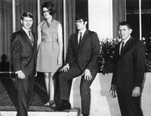 The Senior Class Officers of '68-'69 pose in front of Behrens Auditorium.