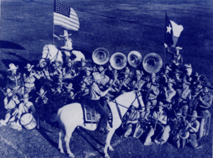 Members of the Cowboy Band pose for a picture in the 1940 Bronco.