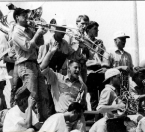 The Cowboy Band plays fanfare at a football game in 1995.