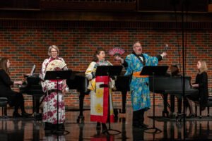 Three of HSU's vocal instructors perform a theatrical piece during their concert.