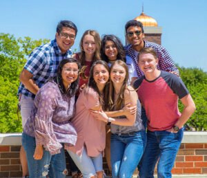 A group of students poses for a photo.