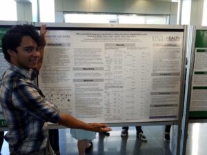 Yeremyah Phillips presents his poster project at UNT