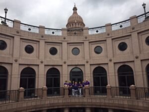 Visiting the Texas Capitol, the 2018 Doctorate of Leadership cohort takes a break outside to visit the outdoor rotunda.