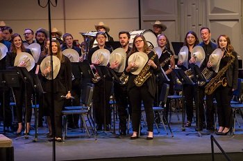 The HSU Concert Band closes a performance with song.