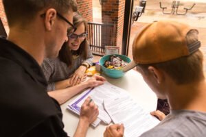 Alyssa Rasco helps students improve their resumes at Resumes at Lattes.