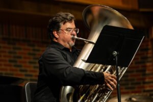 Dr. Jeffrey Cottrell plays the tuba during Oktubafest.