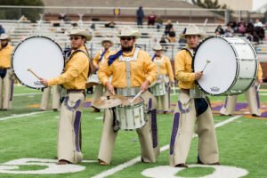 The World Famous Cowboy Band performs during halftime at the football game.