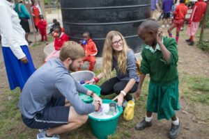 Students work with AIC Childare in Kenya