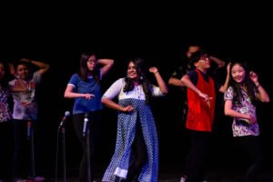 International students perform a culturally inclusive dance number during SING 2017.