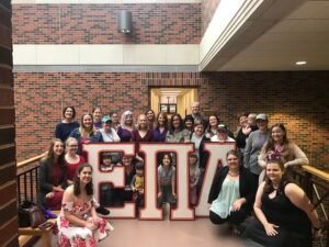 Epsilon Pi Alpha's 2016 recharter class poses with EPiA alumnae at their 2018 homecoming brunch.