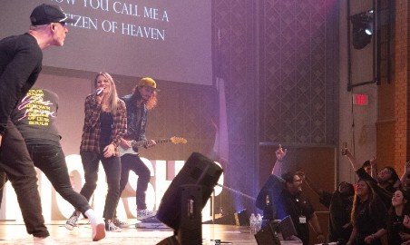 A guest worship band at chapel.