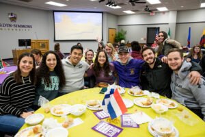 Friends gather during Taste of the World to celebrate community and try new food.