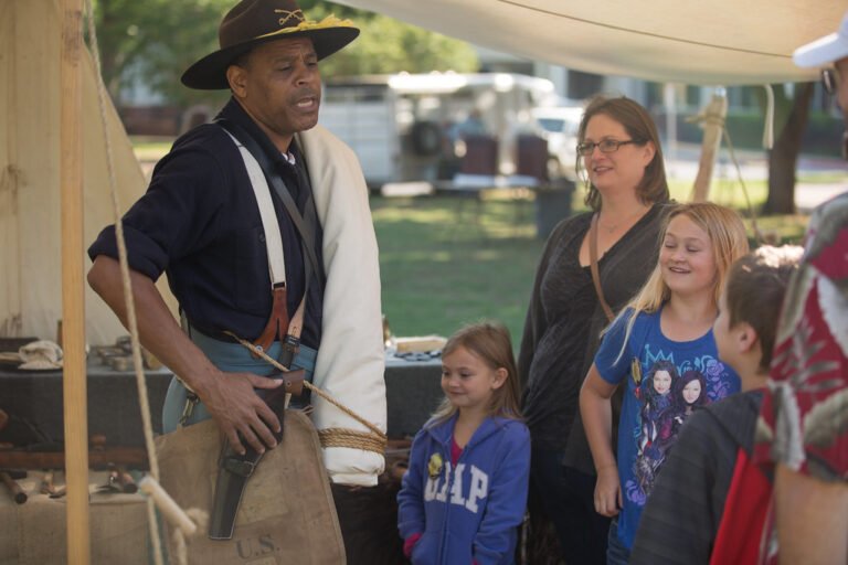 Western Heritage Day participants hear a story during the festivities.