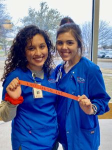 Close friends and senior nursing students, Ashleigh Jacquez (left) and Emily Pierce pose for a photo after their final clinical at HSU’s Patty Hanks Shelton School of Nursing.