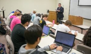 Dr. McIntyre teaches a business class.