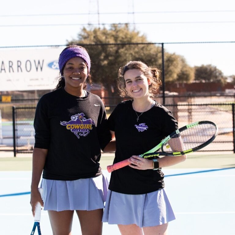 Two HSU women's tennis players
